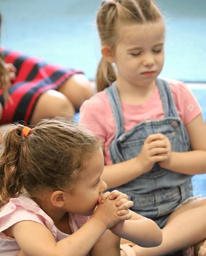 Immanuel Lutheran School students praying