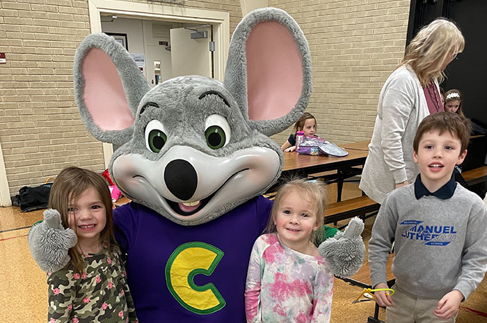 Chuck E. Cheese drops in on Immanuel